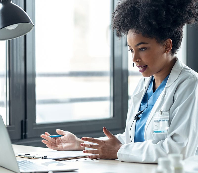 Doctor from Urgent Care for Children on a telehealth call with a patient
