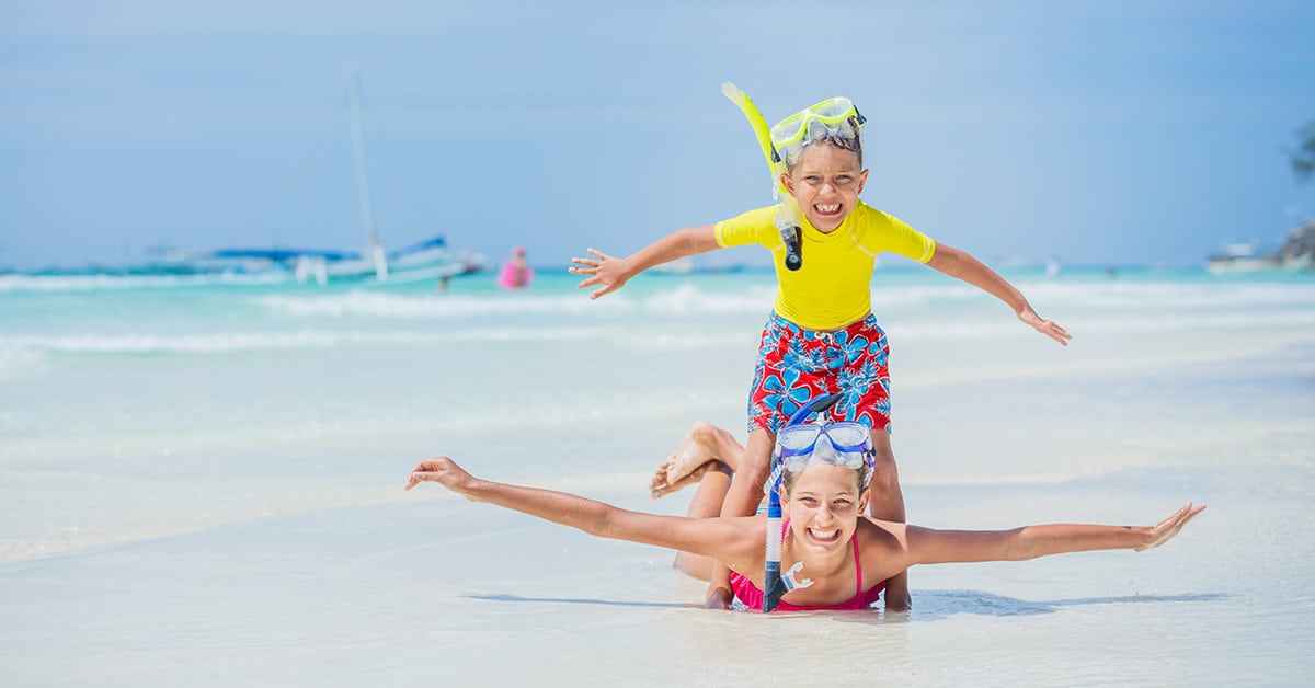 children at the beach practicing safe measures suggest by Urgent Care for Children