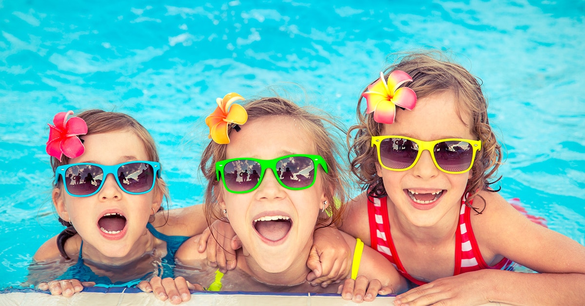 kids swimming in a pool after having checkups at Urgent Care for Children