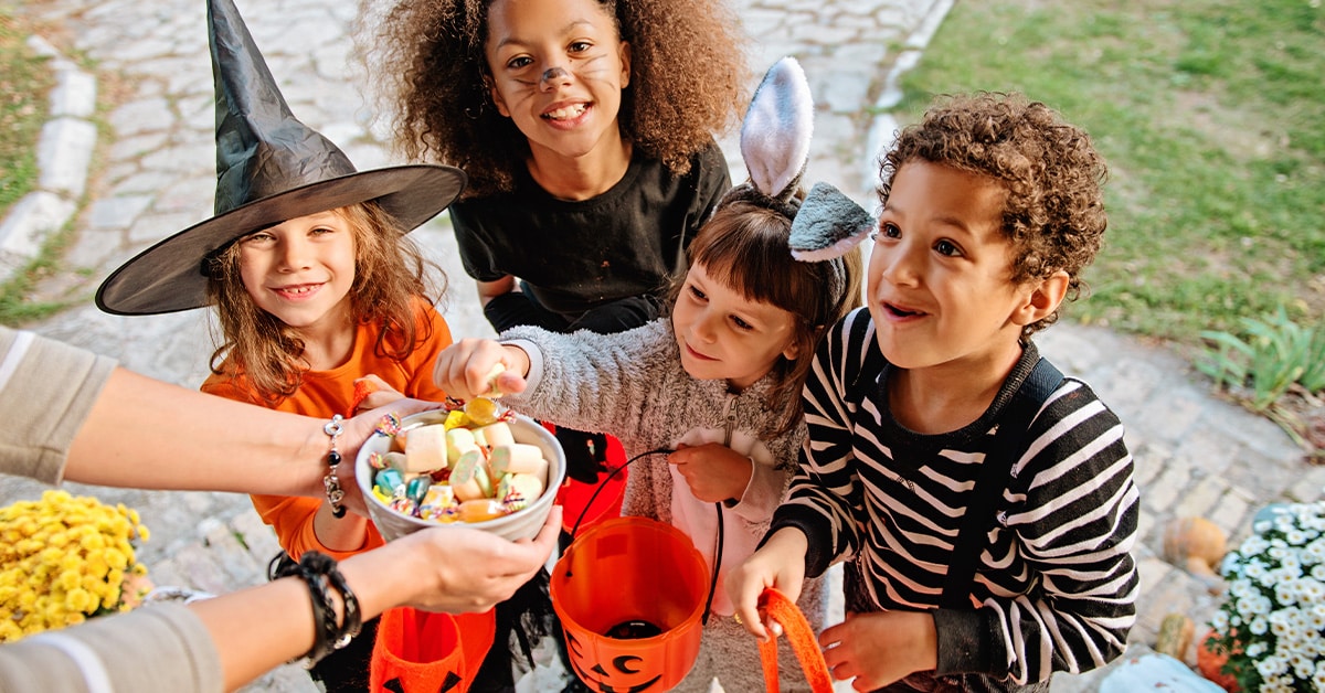 Kids getting candy on halloween