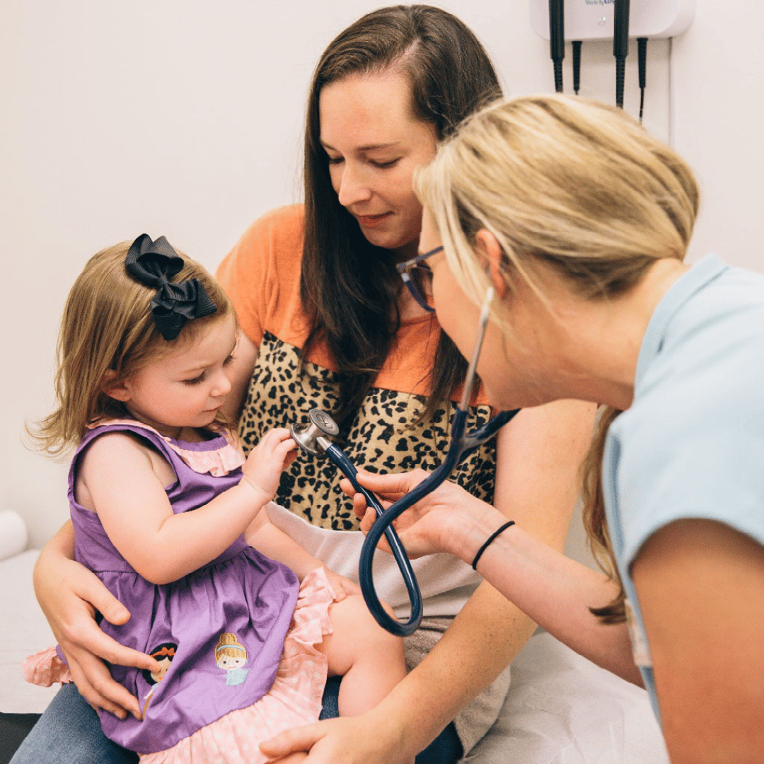 Urgent Care for Children doctor performing a check up on a child