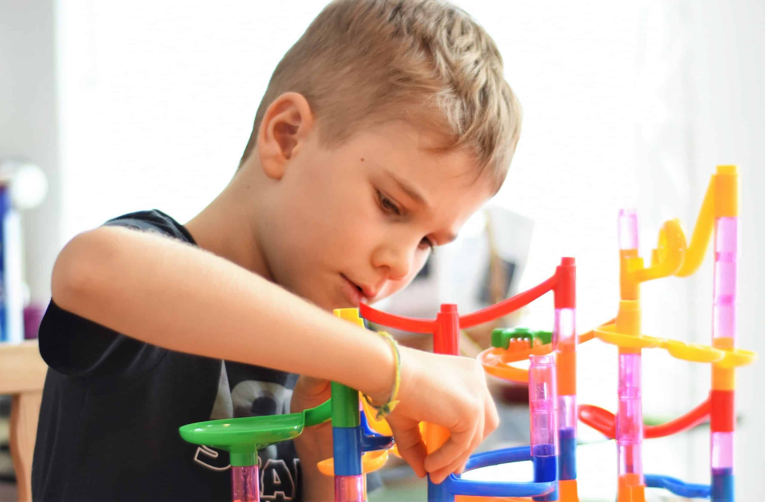 Child playing with STEM kit